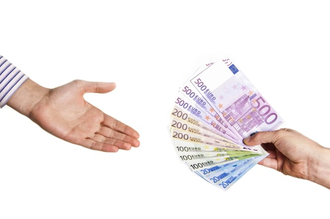 man-hand-taking-euro-notes-2024-10-23-04-03-45-utc
